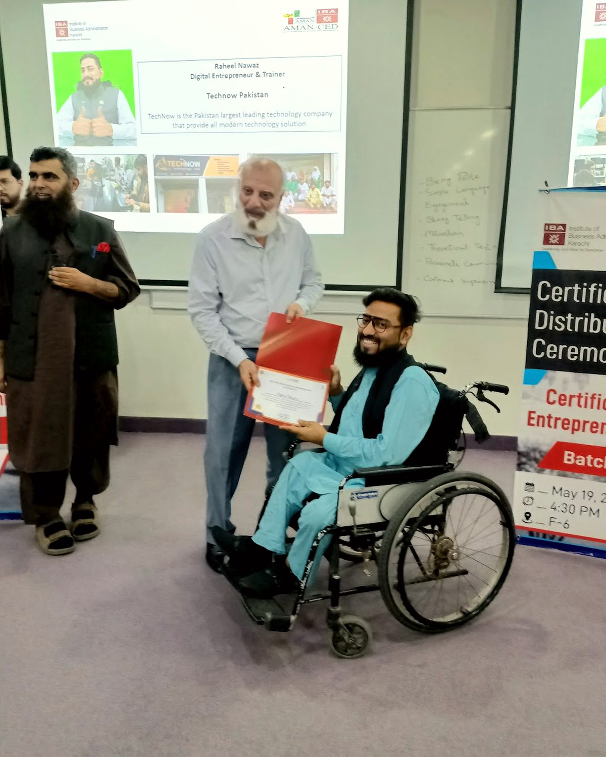Raheel Nawaz receiving a certificate at an entrepreneurship training ceremony